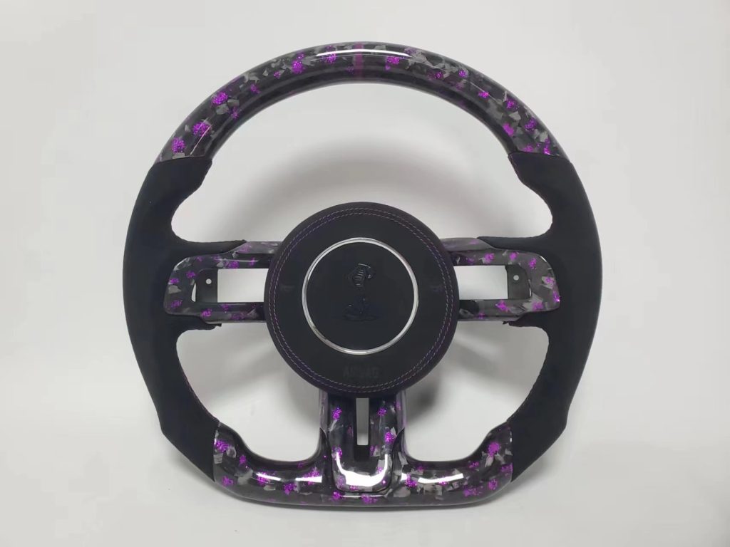 CUSTOMIZABLE CARBON FIBER STEERING WHEEL